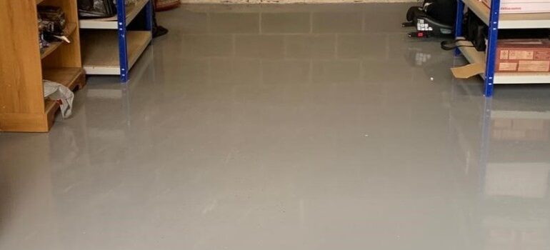 rein flooring system installed in a local garage for low maintenance and durability