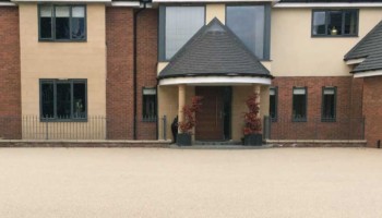 custom-made resin bound driveway installed in a residential area