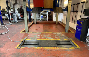 Springwell Motor Mechanics before the installation of flooring by epoxy flooring contractors