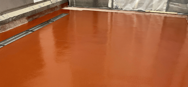The inside of a food factory that is going to pass its BRC audit due to having a new resin floor installed that is durable and easy to keep clean