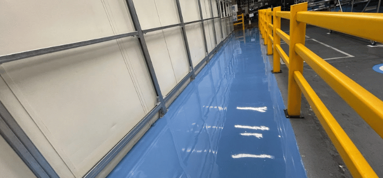 A warehouse showing off their new epoxy screed as one of the best types of screed floor finishings for their business
