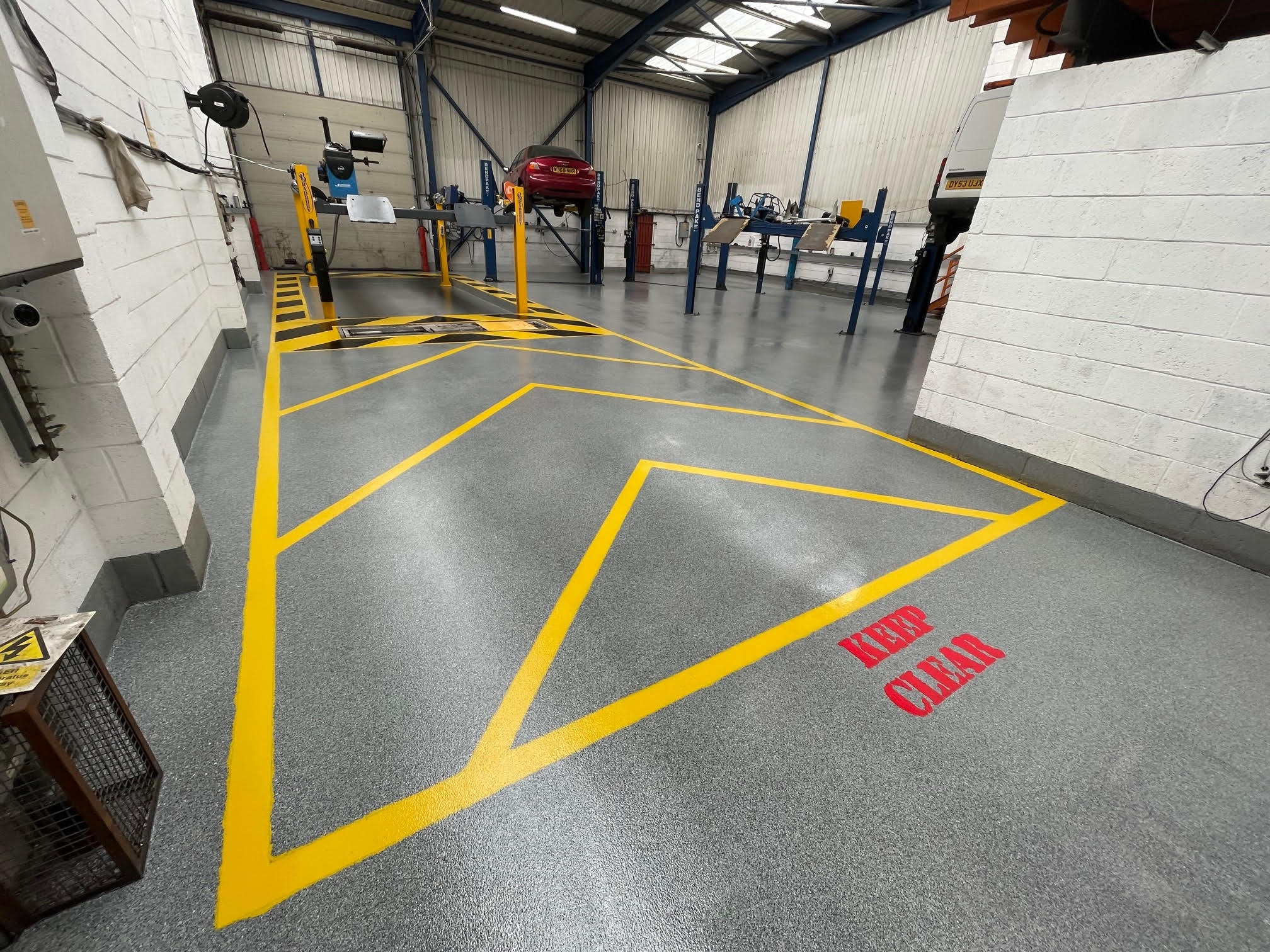 A car garage workshop that went with resin flooring for their business which is perfect for this industry.