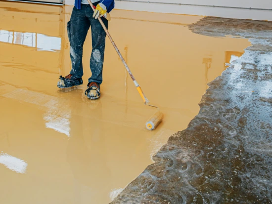 Applying resin to industrial flooring