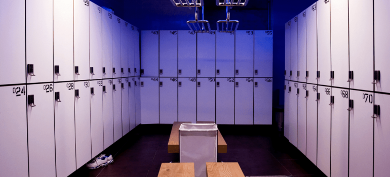 A gym changing room with a resin flooring system to ensure easy maintenance.