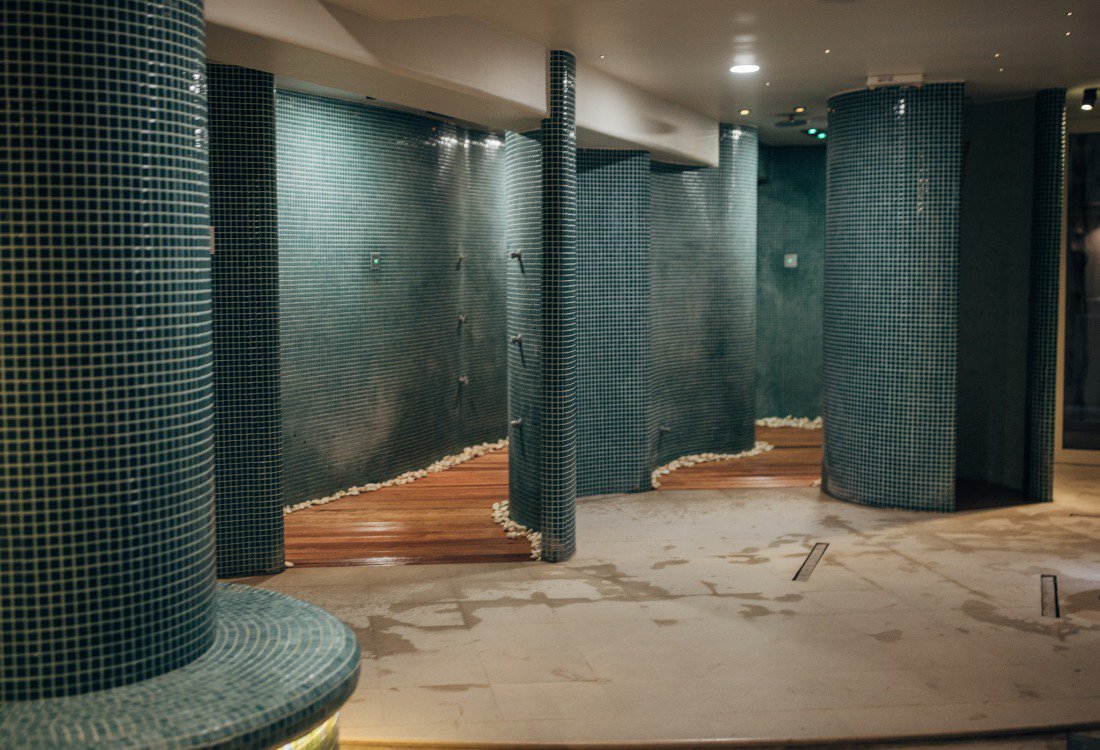 A beautiful blue tiled hotel spa in the UK.