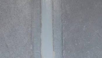installation work carried out by flooring specialists to incorporate polymer screeds into a flooring system for a more hygienic environment